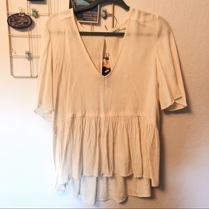 White tunic top with open back